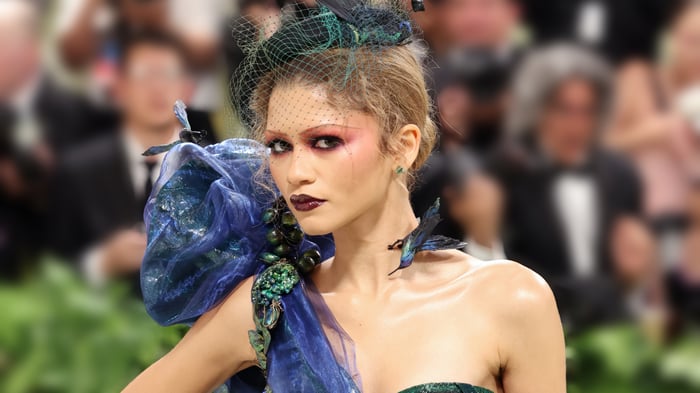 Zendaya in a dramatic costume with bird and floral accents