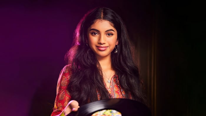 Avantika Vandanapu holding a vinyl record