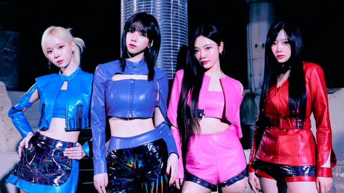 Aespa members in futuristic outfits