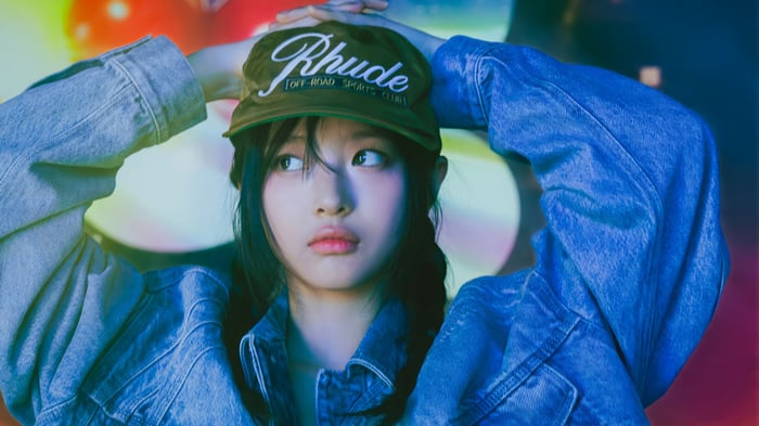 Hanni from NewJeans wearing a Rhude hat
