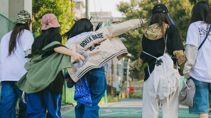 NewJeans girls walking on a street