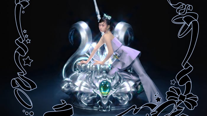 Yujin from IVE on a silver throne