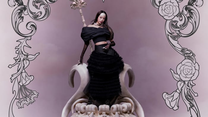 Wonyoung of IVE sitting on a throne with ornate decorations
