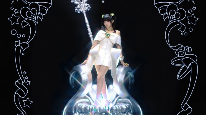 Rei from IVE with a staff and ornate frame