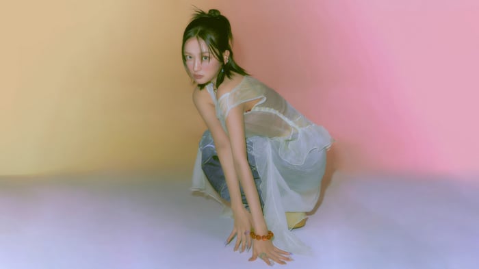Yujin from IVE in a sheer dress