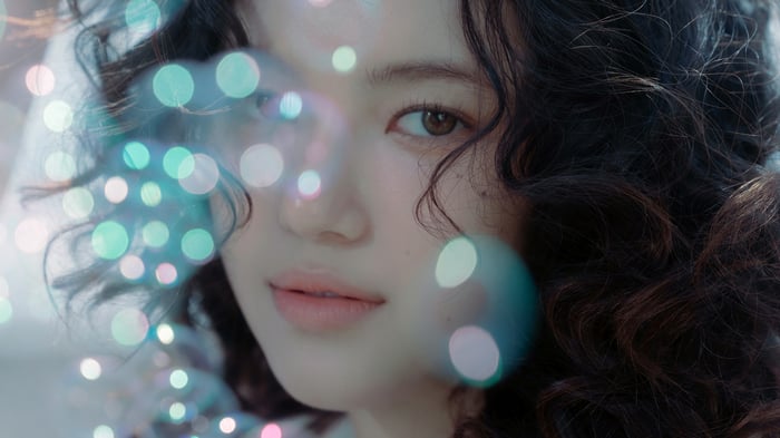 Danielle from NewJeans with bokeh lights