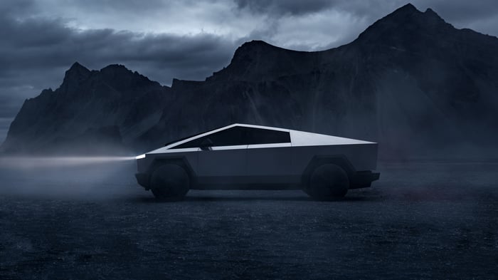 Tesla Cybertruck in a foggy, mountainous landscape