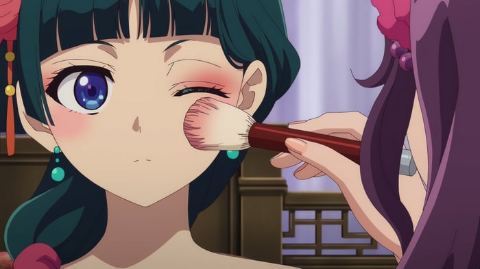 Maomao from The Apothecary Diaries getting makeup applied