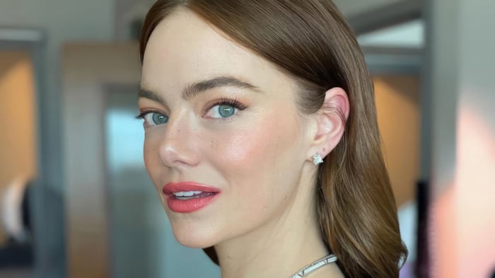 Emma Stone wearing diamond earrings and necklace