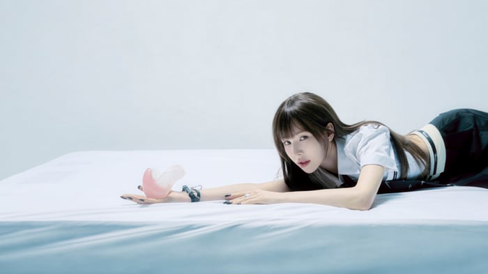 Wendy from Red Velvet on a white surface