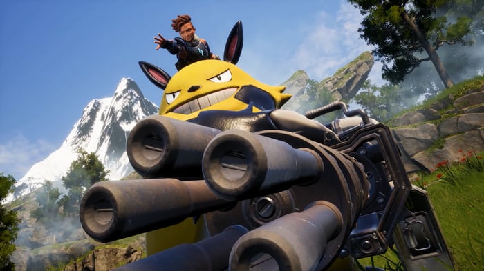 Palworld: Man riding a yellow creature with a gun