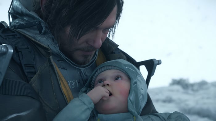 Sam Porter Bridges holding Lou in Death Stranding 2 4K