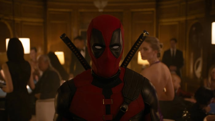 Deadpool in a casino with swords