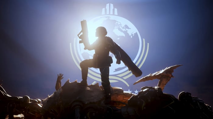 Helldivers 2 soldier standing on alien remains