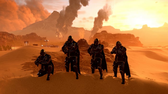 Helldivers 2 soldiers on a desert planet