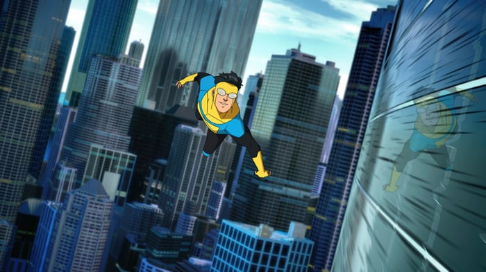 Invincible Flying Over Cityscape 4K