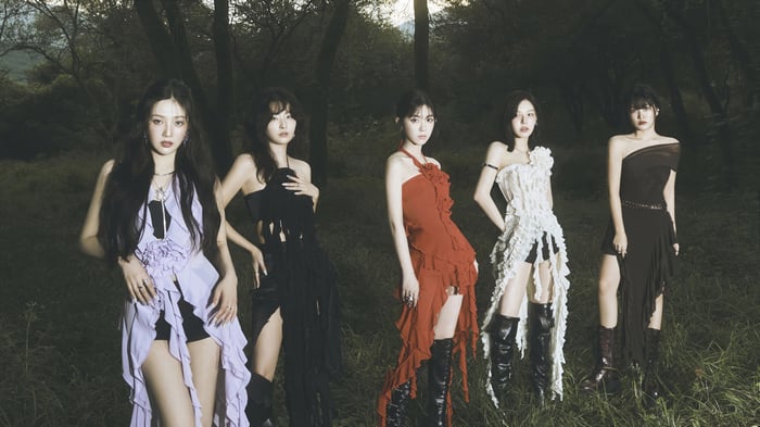 Red Velvet members in a dark forest setting