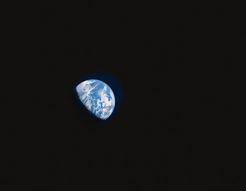 Earth seen from space against a dark background