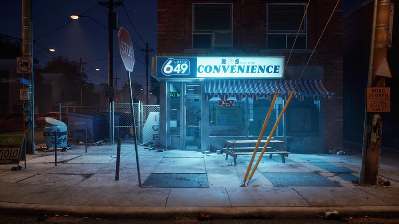 Convenience store at night with street sign