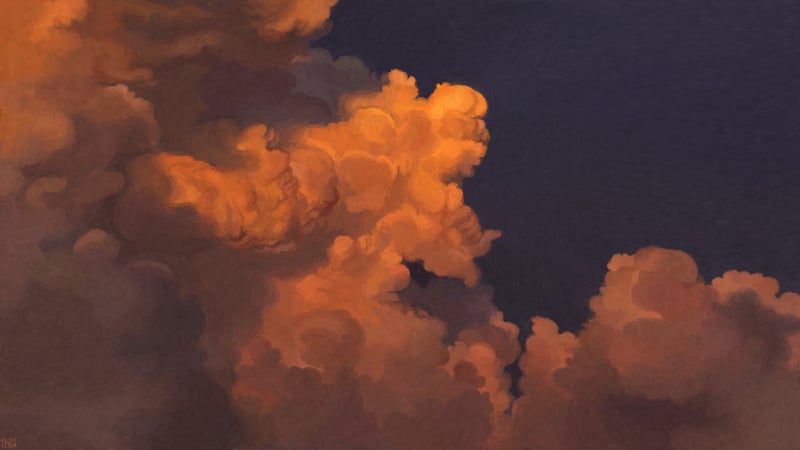 Orange cumulus clouds at dawn