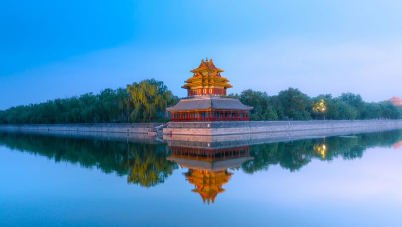 Corner Tower of the Forbidden City reflected in water