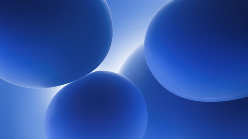 Abstract 3D Blue Bubbles on Gradient Background