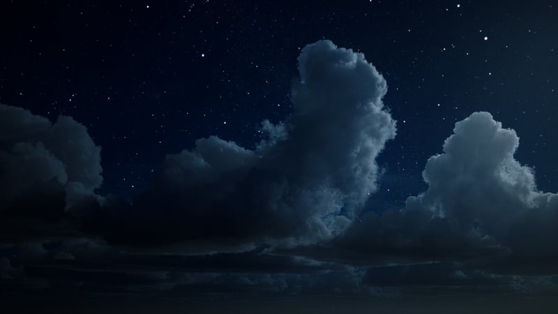 Night sky with clouds and stars