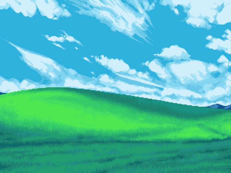 Pixelated green hills under a blue sky with clouds