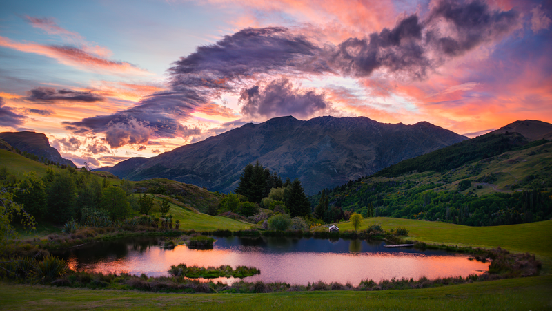 Mountain landscape with a lake at sunrise