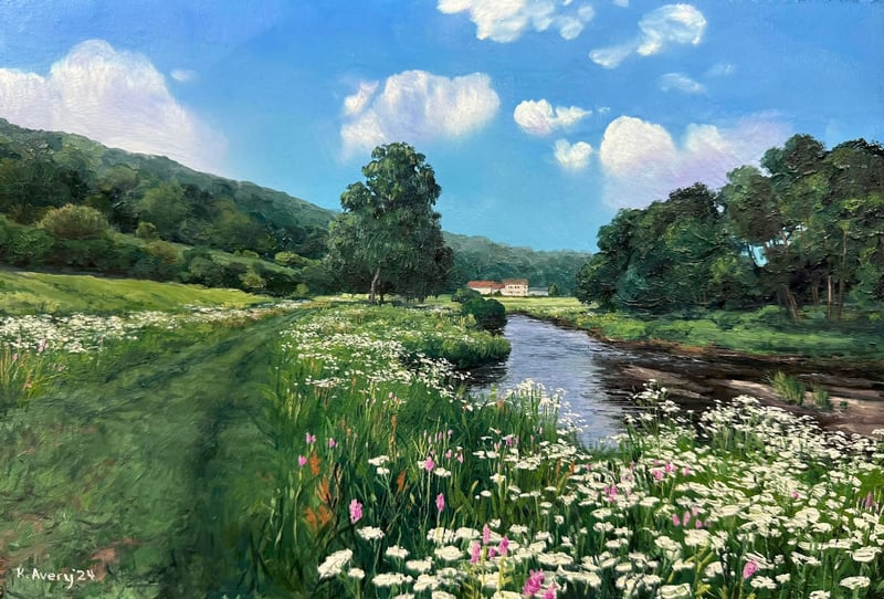 Scenery: A river flows through a field of wildflowers