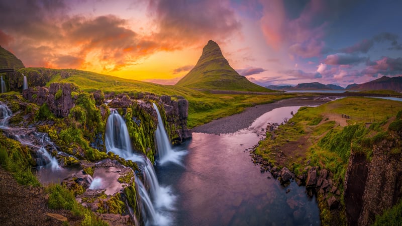 Kirkjufell mountain and waterfall at sunset