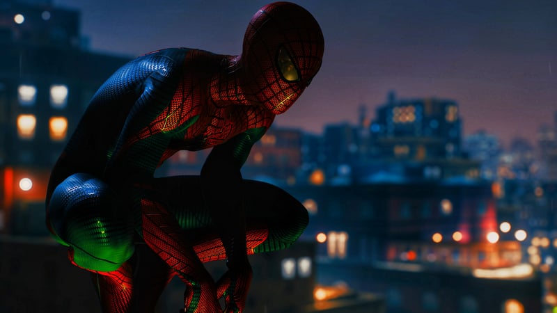 Spider-Man squats on a building overlooking a city at night