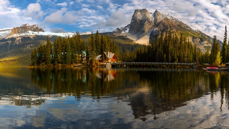 Emerald Lake with Mountains and Forest Reflection