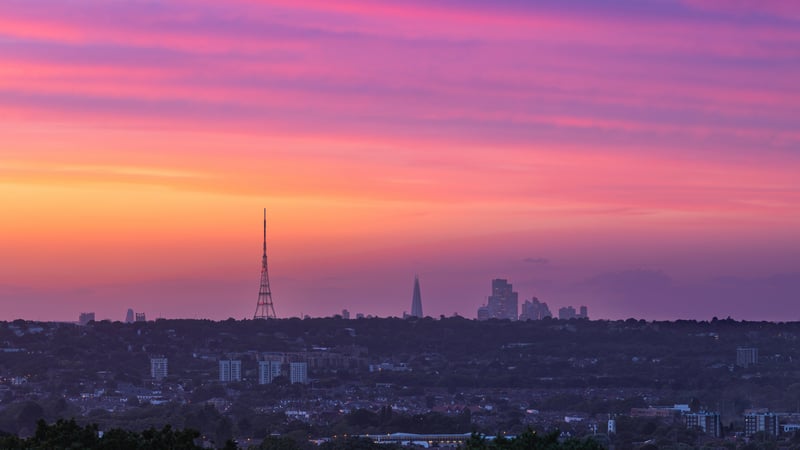 City skyline at sunset with colorful sky