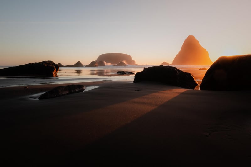 Sunset over Oregon coast with sea stacks and rocks