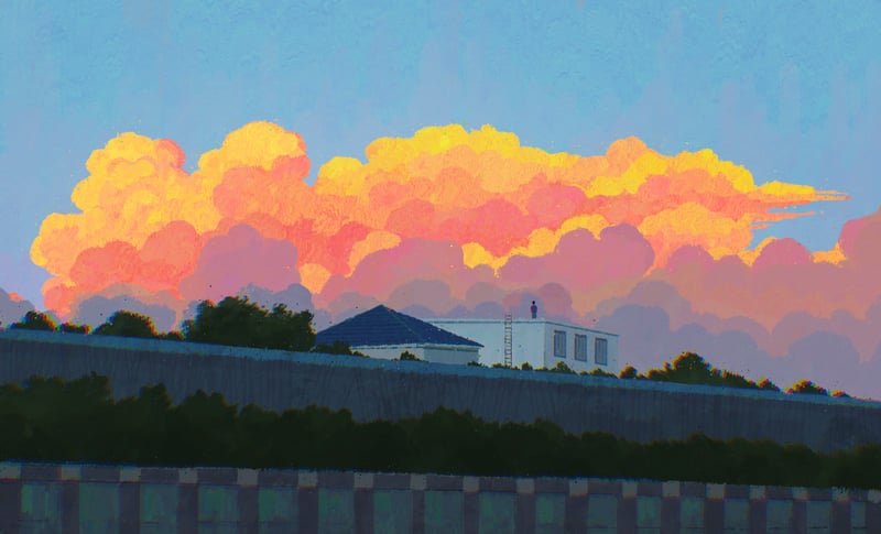 Scenery of orange clouds over a house