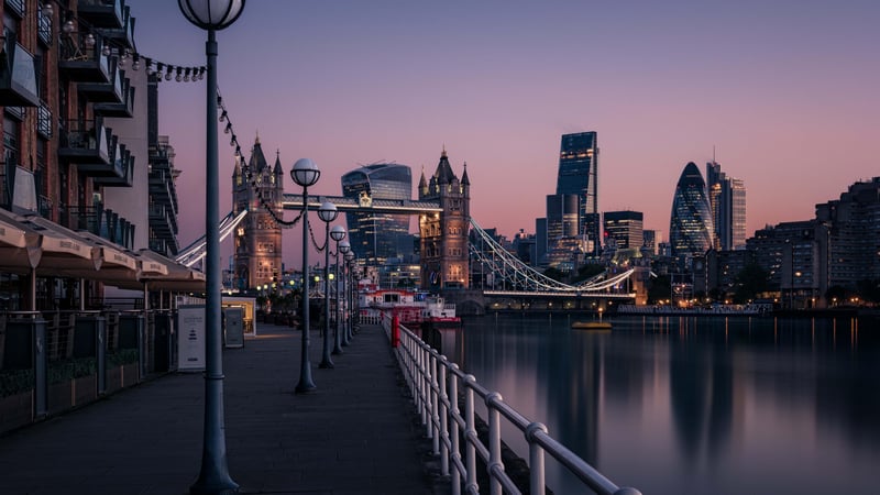 Ship on the Thames River with Tower Bridge in London