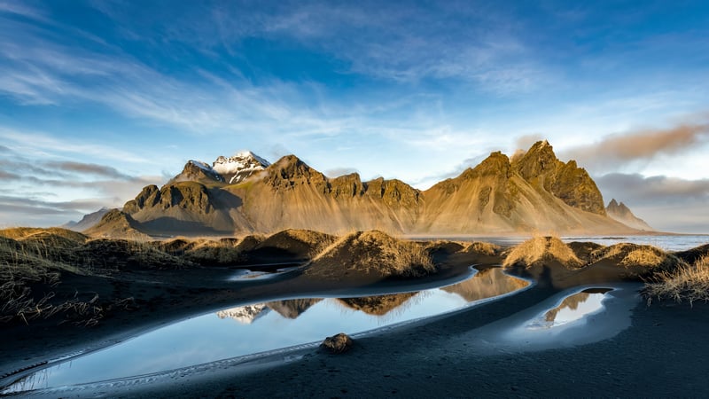 Vestrahorn Mountains Reflected in Water in Iceland