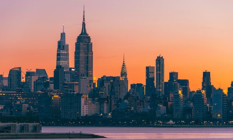 New York City skyline at sunset over water