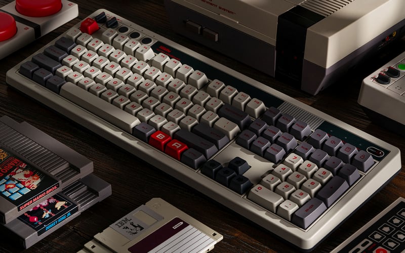 Nintendo Entertainment System keyboard with retro game cartridges