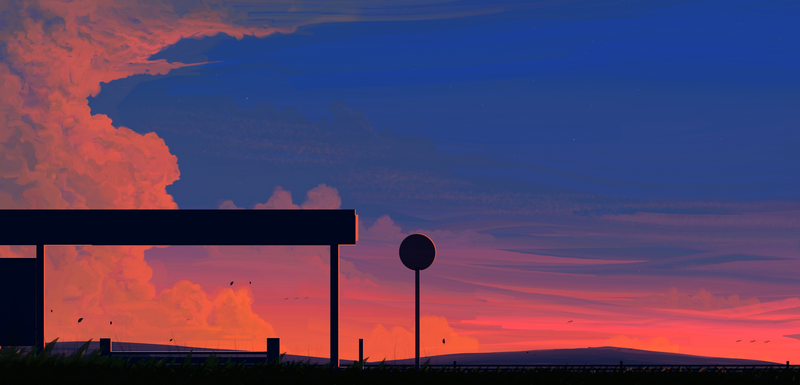 Scenery of a sunset with clouds and silhouettes