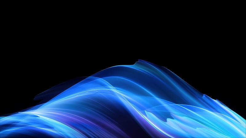 Abstract blue light trails on black background