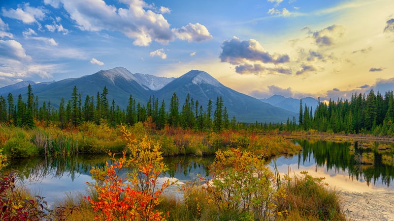 Autumn landscape with mountains and reflection