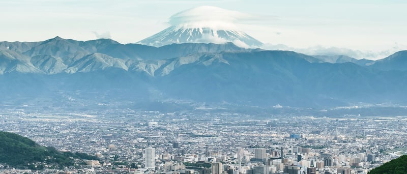 Mount Fuji Overlooking a Japanese Cityscape