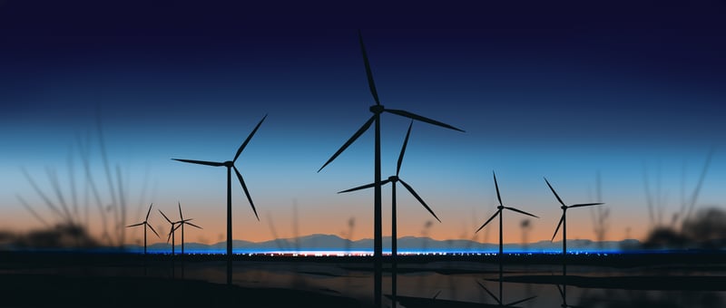 Wind turbines in a landscape at dusk