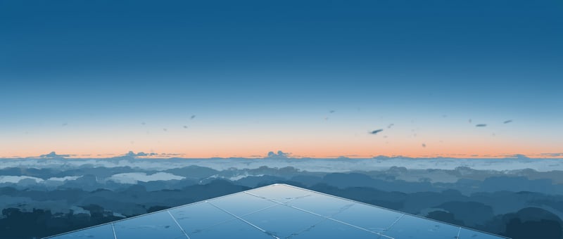 Solar panels overlooking a misty mountain landscape at dawn