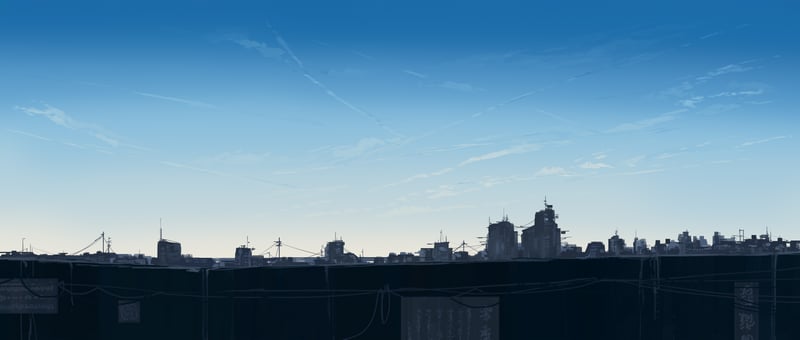 Cityscape with tall buildings under a blue sky