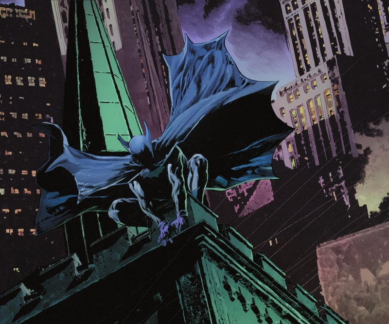 Batman crouching on a building at night