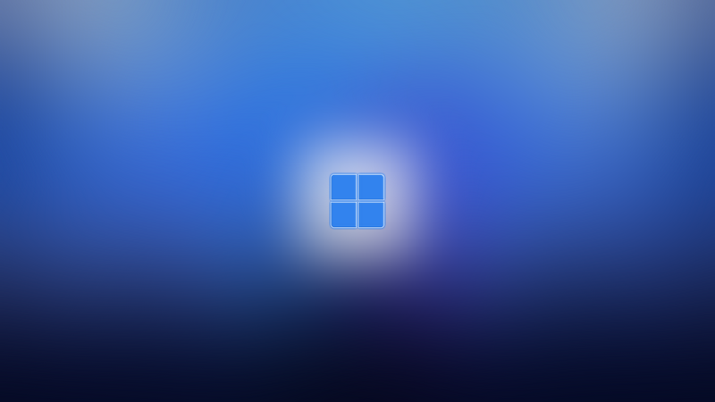 Windows 11 logo on a blue blurred background