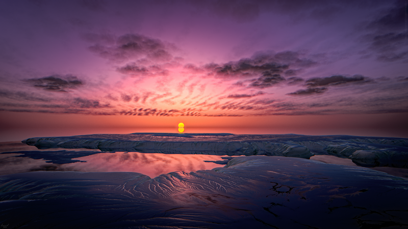 Sunset over the ocean with colorful clouds and reflection